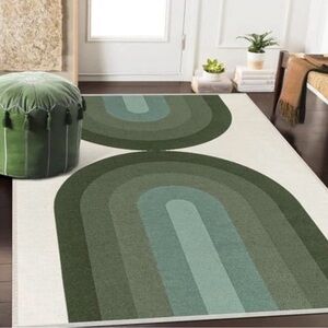 Lahome green and cream rainbow area rug